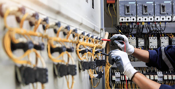 Professional Electrician technician working in Leawood, KS